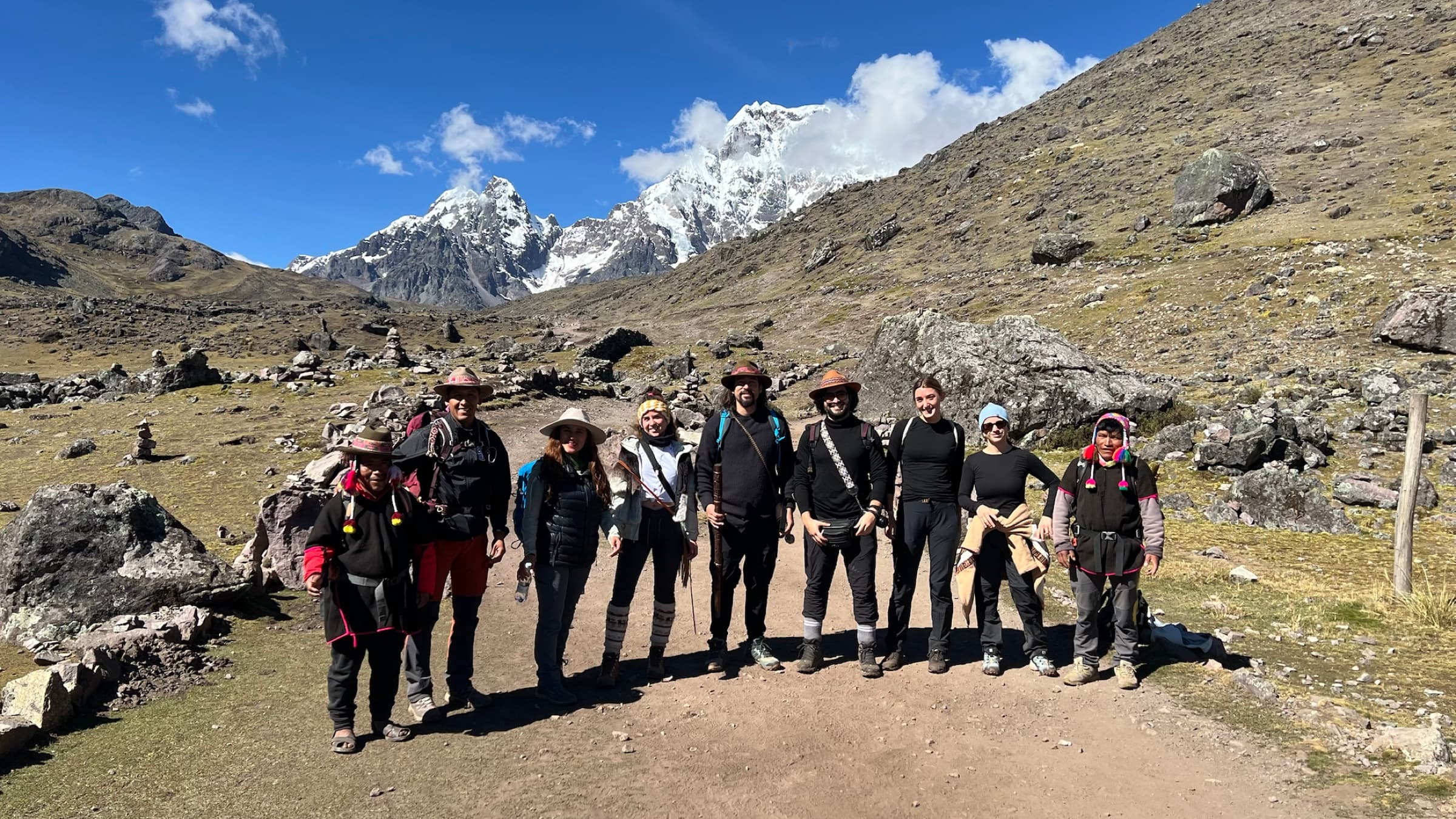 Small group standing together on an Ausangate mountain path